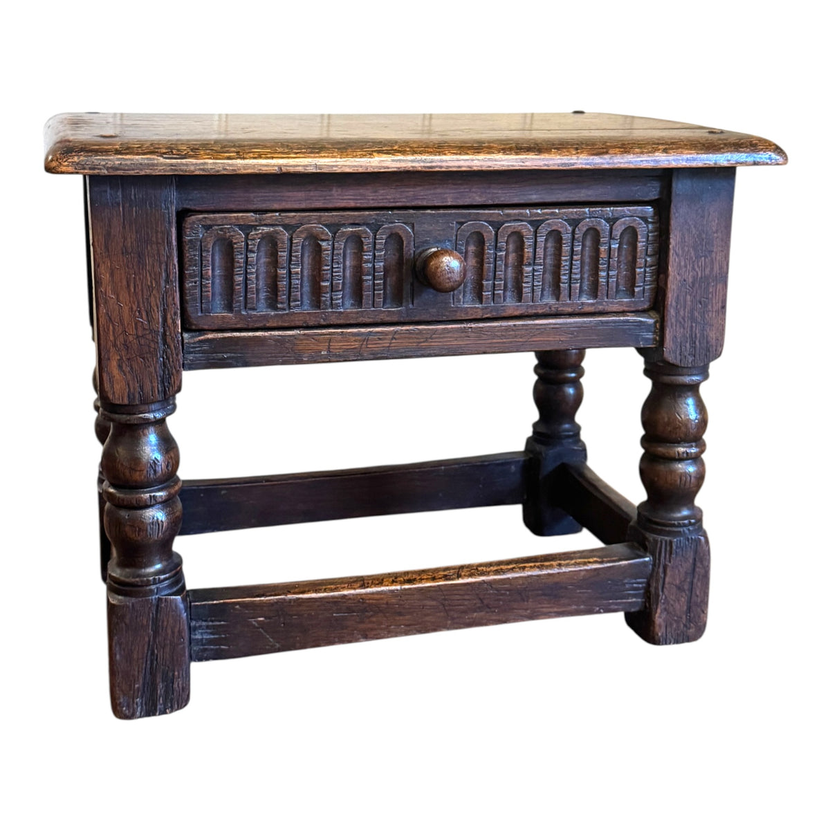 Antique carved oak joint stool side table with single drawer, turned legs and rich dark aged patina, c.1680–1750