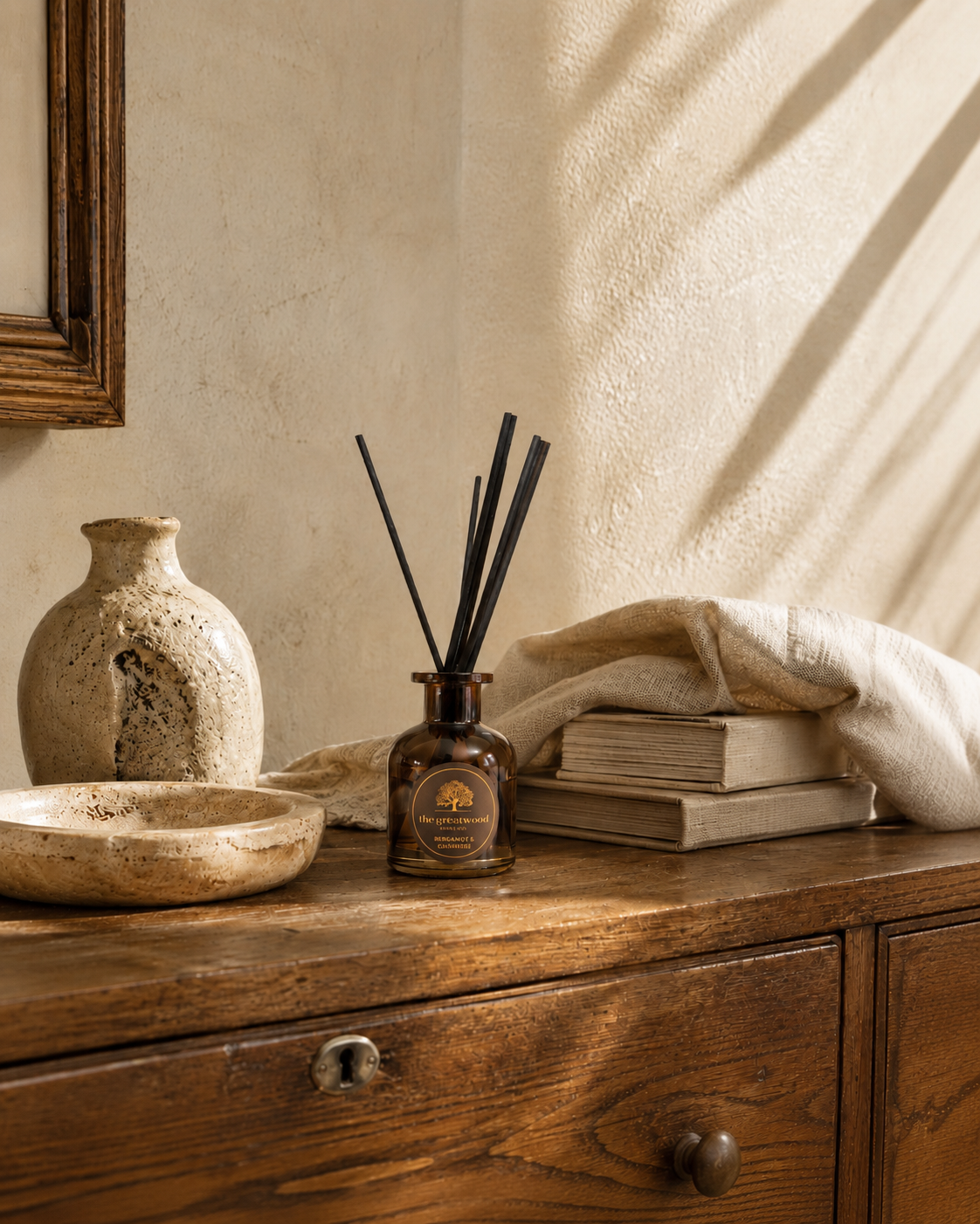 Bergamot & Cashmere reed diffuser by Greatwood Candle Co styled in a warm neutral Odloft interior