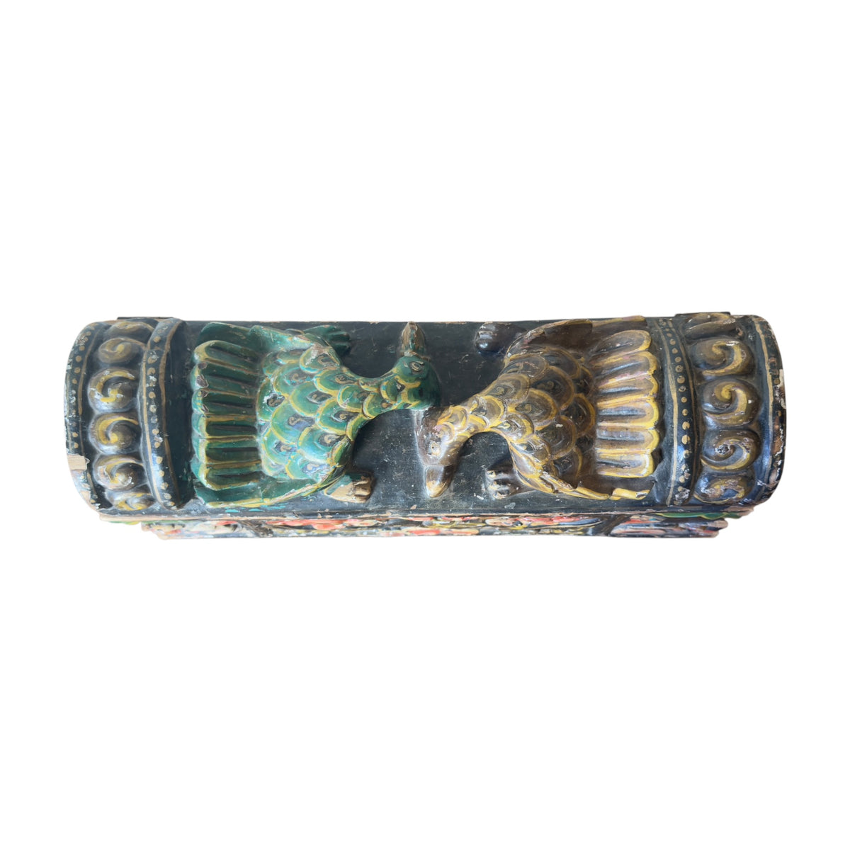 Top view of antique Indian dowry box with paired carved bird motifs and heavily worn polychrome finish