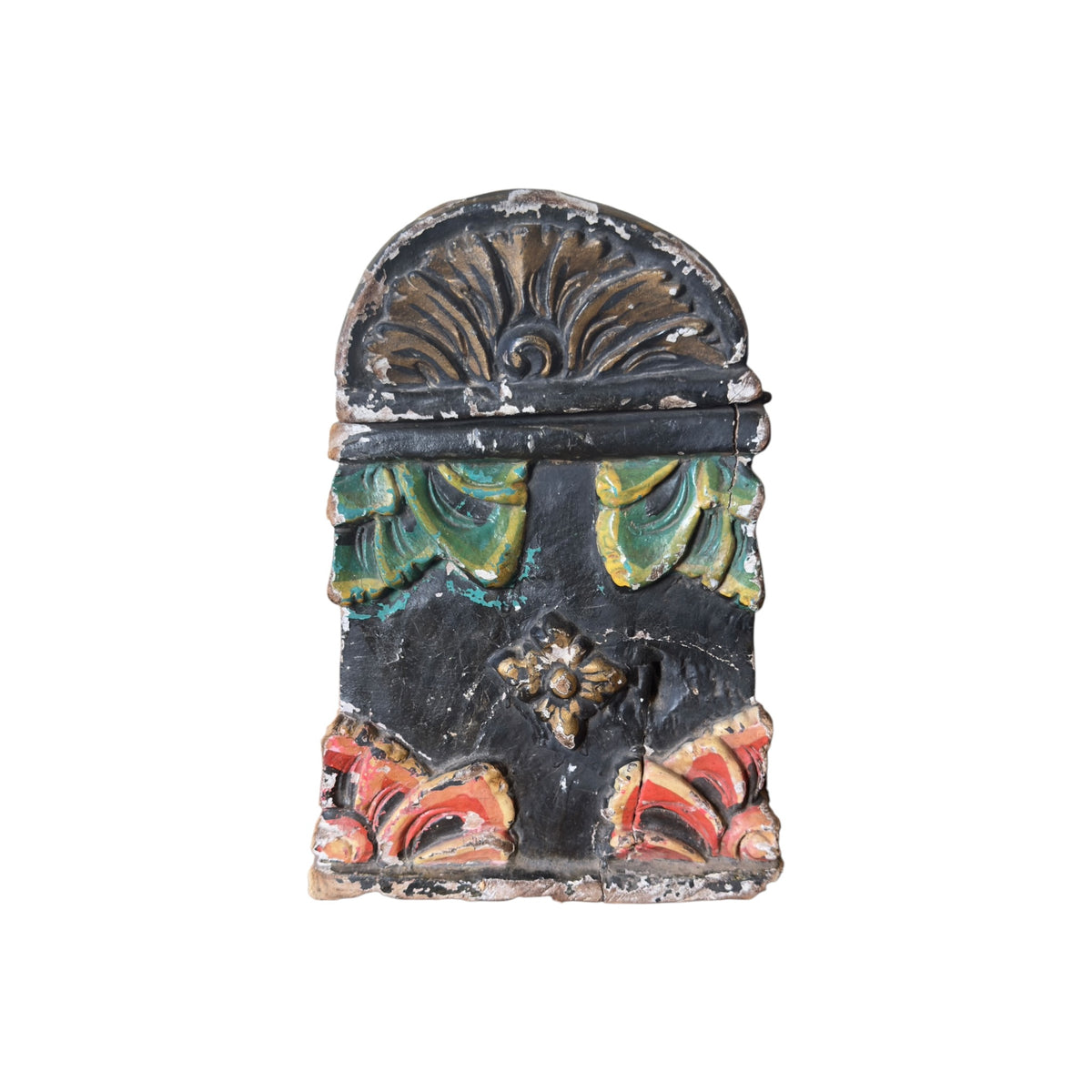 Side view of antique Indian carved dowry box with stylised bird and floral decoration
