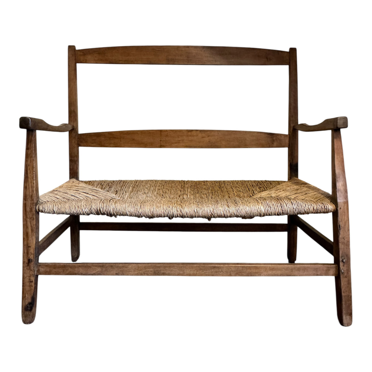 Antique English Arts & Crafts walnut two-seater settee c.1900 with hand-woven rush seat and shaped arms