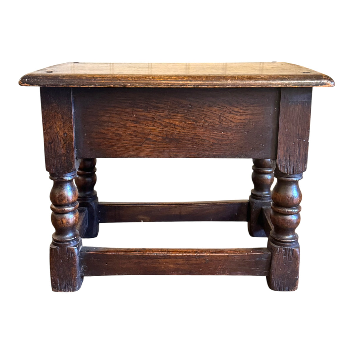 Rear view of antique oak joint stool side table showing solid oak frame, turned legs and stretcher construction