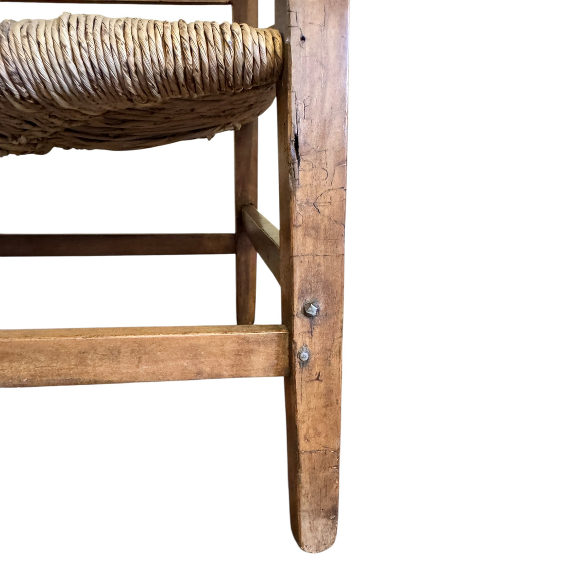 Detail of traditional mortise and tenon construction and natural age-related patina on c.1900 walnut settee