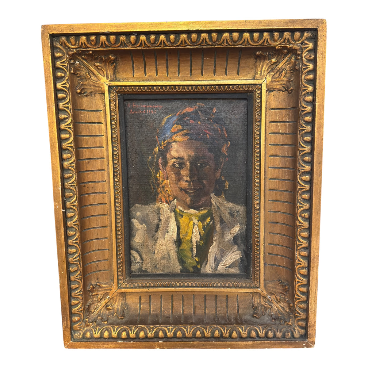 Marrakech portrait signed H. Backmansson and dated 1920, depicting a young sitter in a colourful headwrap within a decorative gilt frame.
