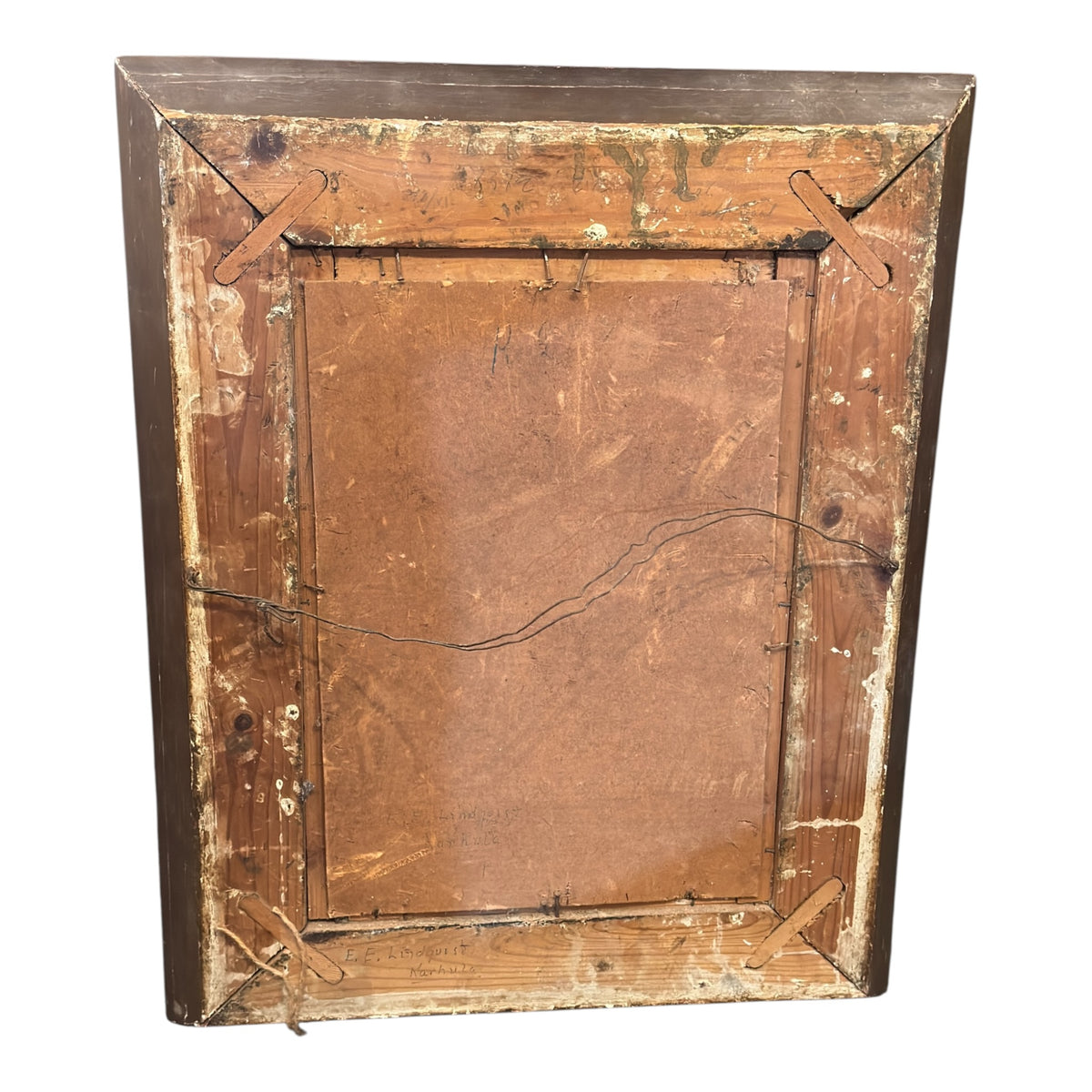 Reverse of the framed portrait showing the board backing, wooden frame, old fixings, hanging wire and handwritten inscriptions