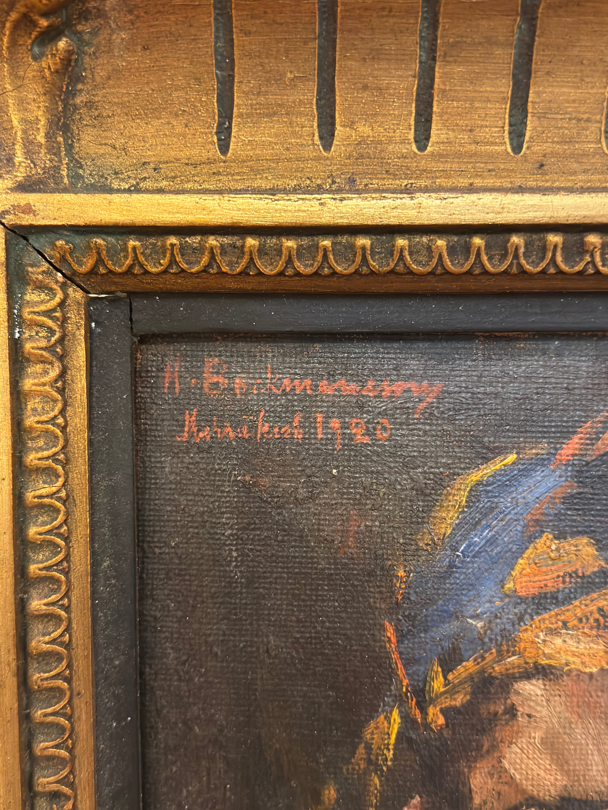 Red H. Backmansson signature and Marrakech 1920 inscription on the dark background of the oil portrait