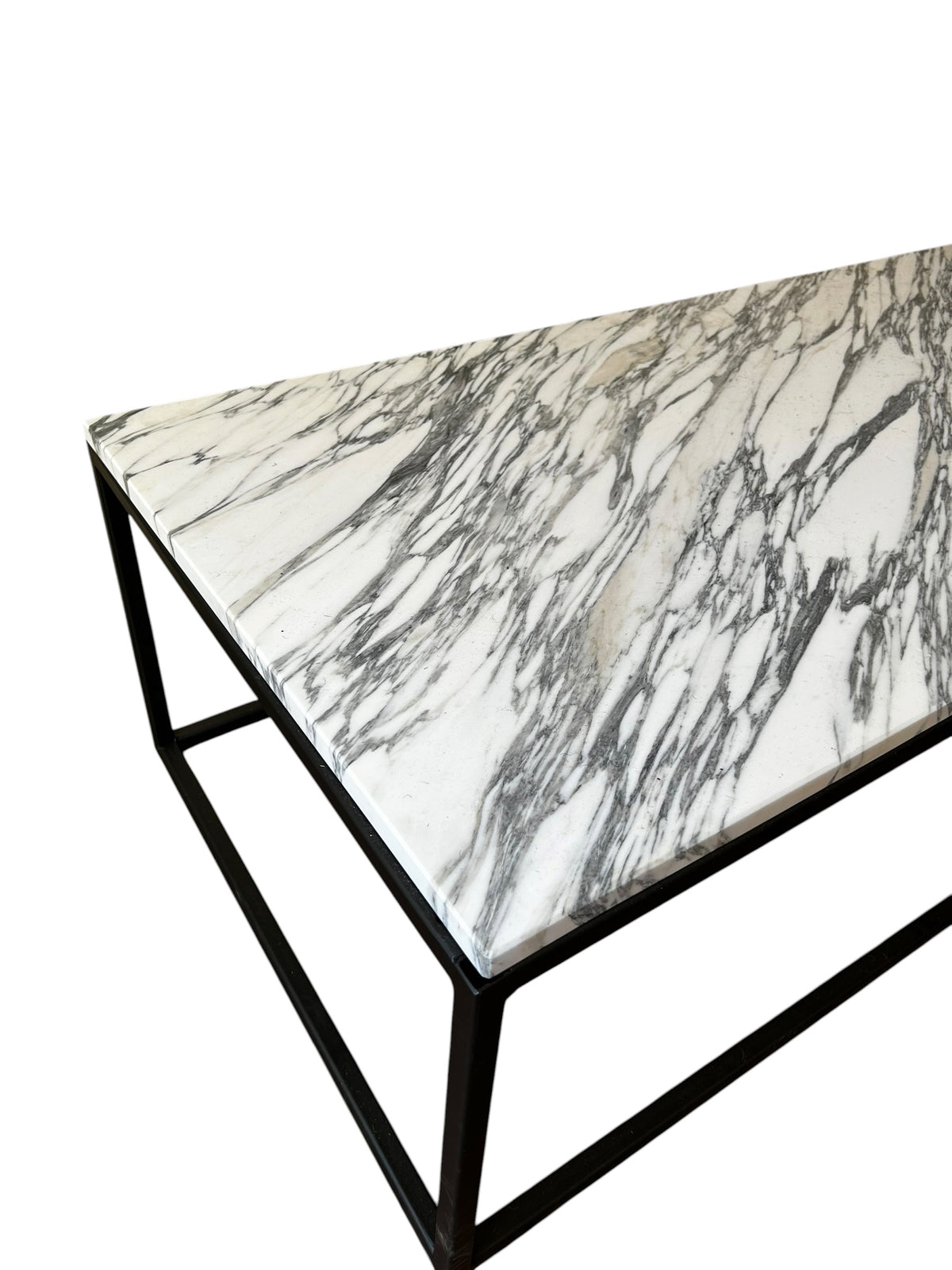 Detailed close-up of the polished Calacatta Vagli marble top showcasing the distinctive natural pattern and mineral character.