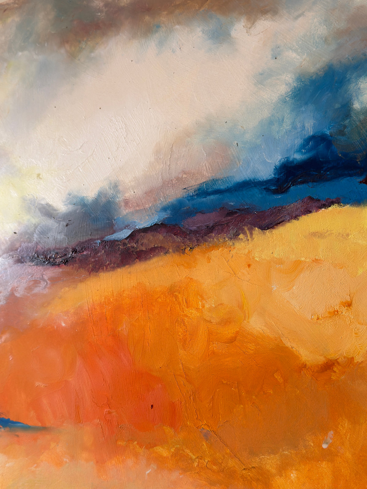 Close-up detail of Clive Fredriksson abstract landscape showing textured oil paint in orange, blue and mauve