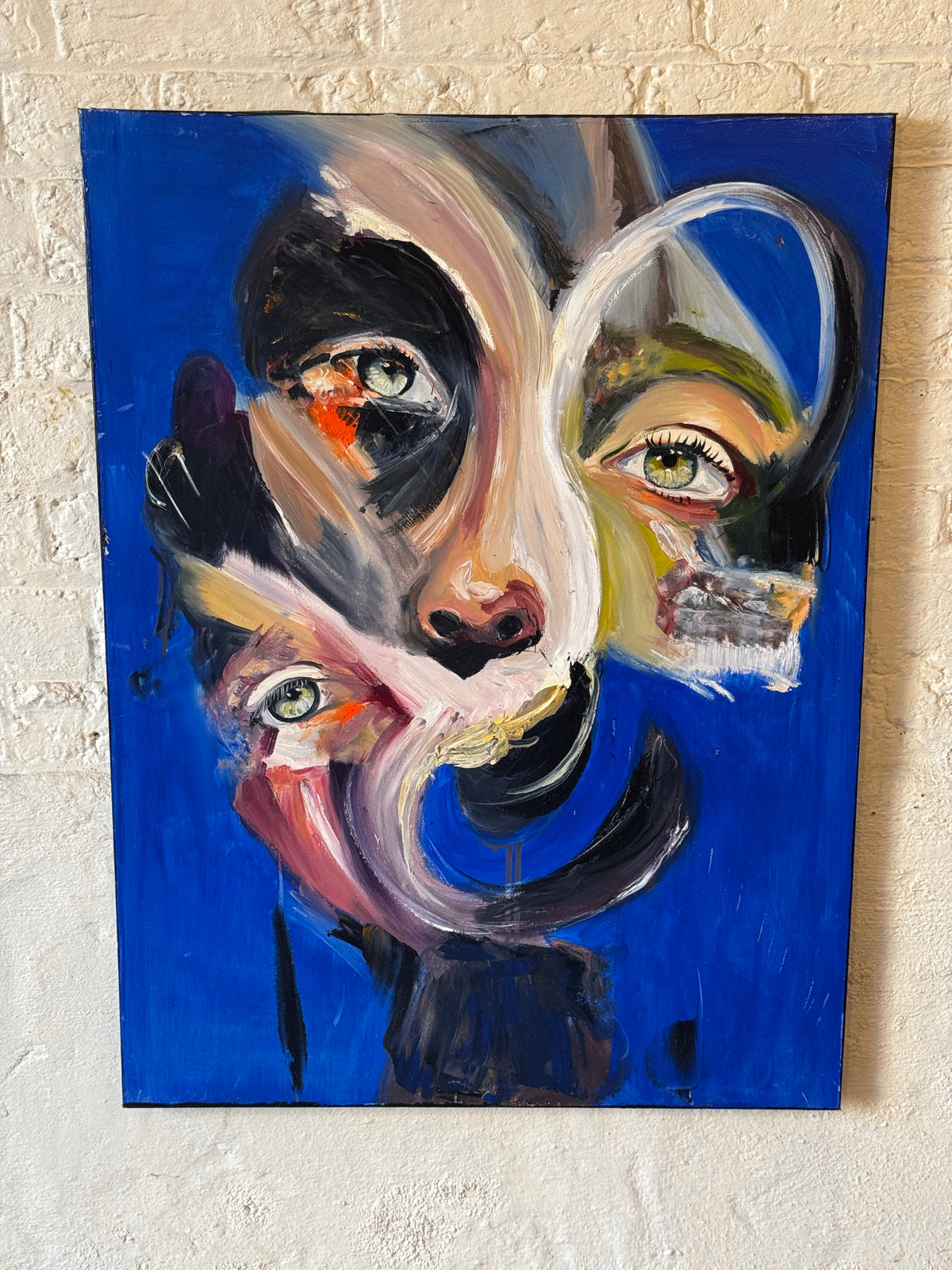 Original abstract portrait painting by Clive with fragmented female face and three eyes against a vivid cobalt blue background